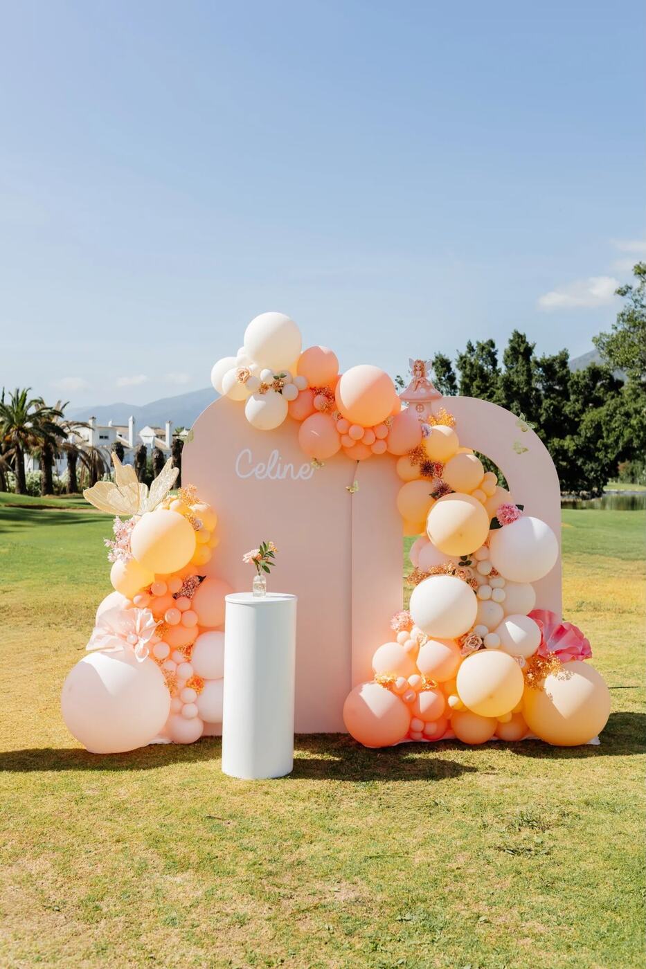 Peach and cream fairy-themed balloon arch for a kids' birthday, Marbella