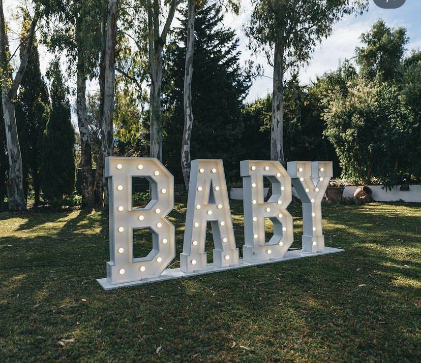 Light-up BABY marquee letters on the lawn, Marbella baby shower