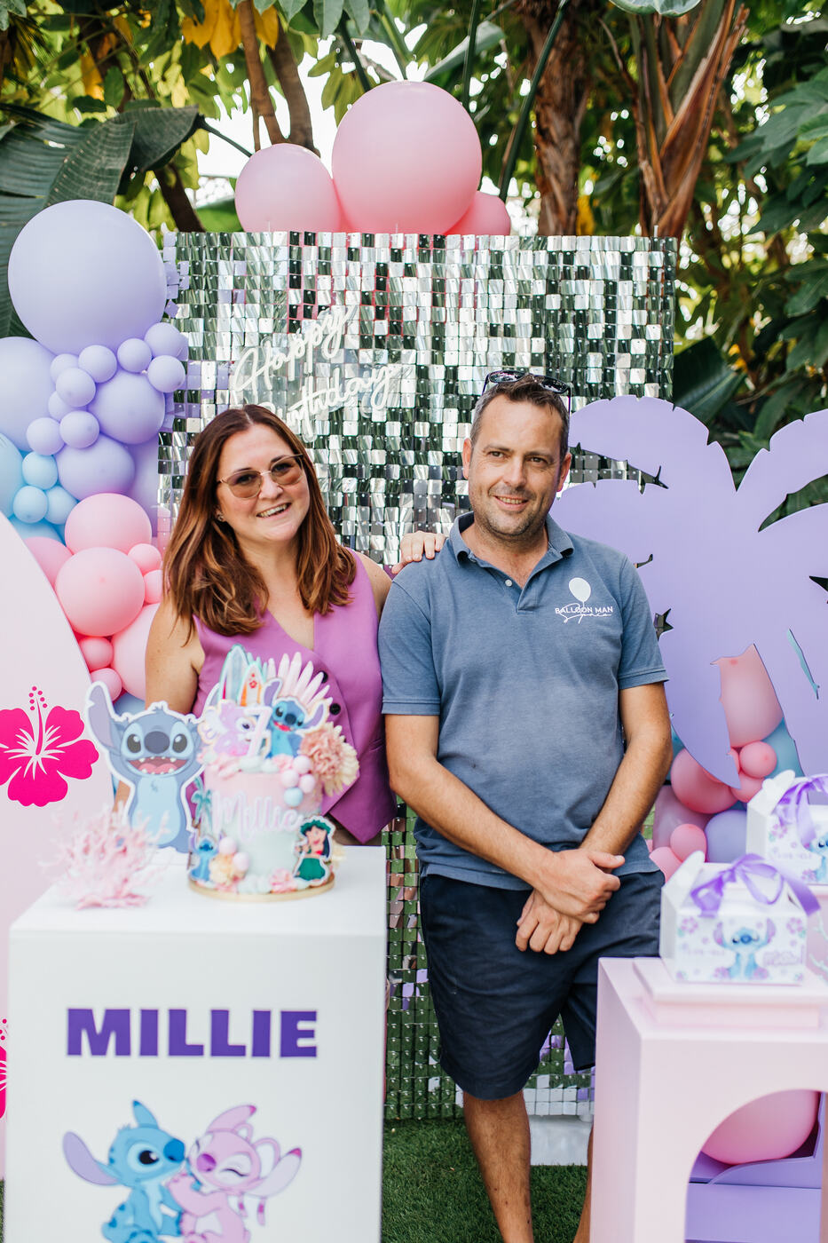 Balloon Man Spain team beside the Stitch birthday cake and personalised pedestal, Marbella